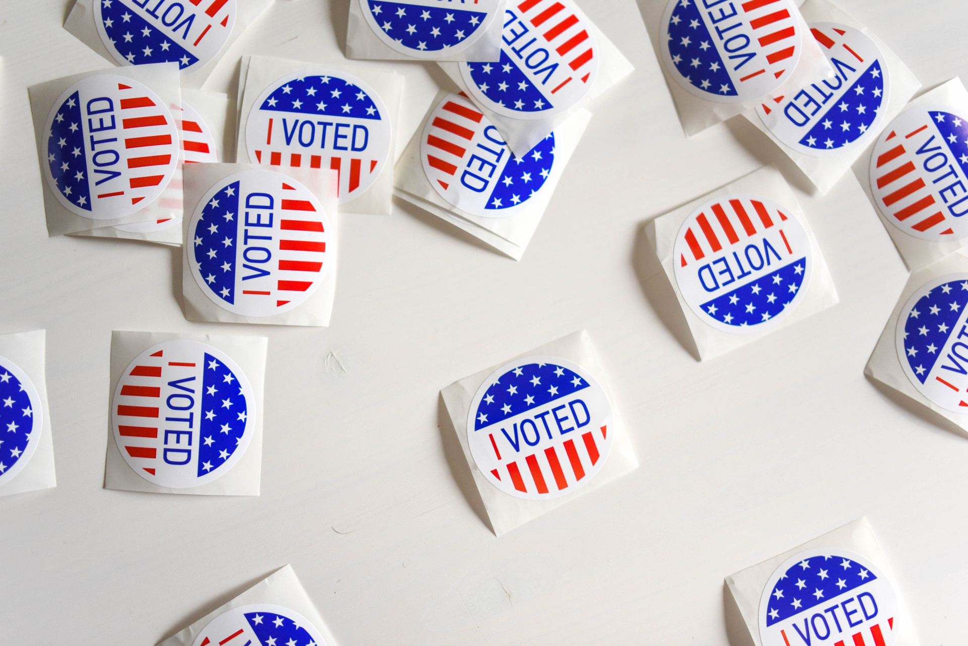 Pretty boring stock art of a bunch of "I Voted" stickers on a white background.