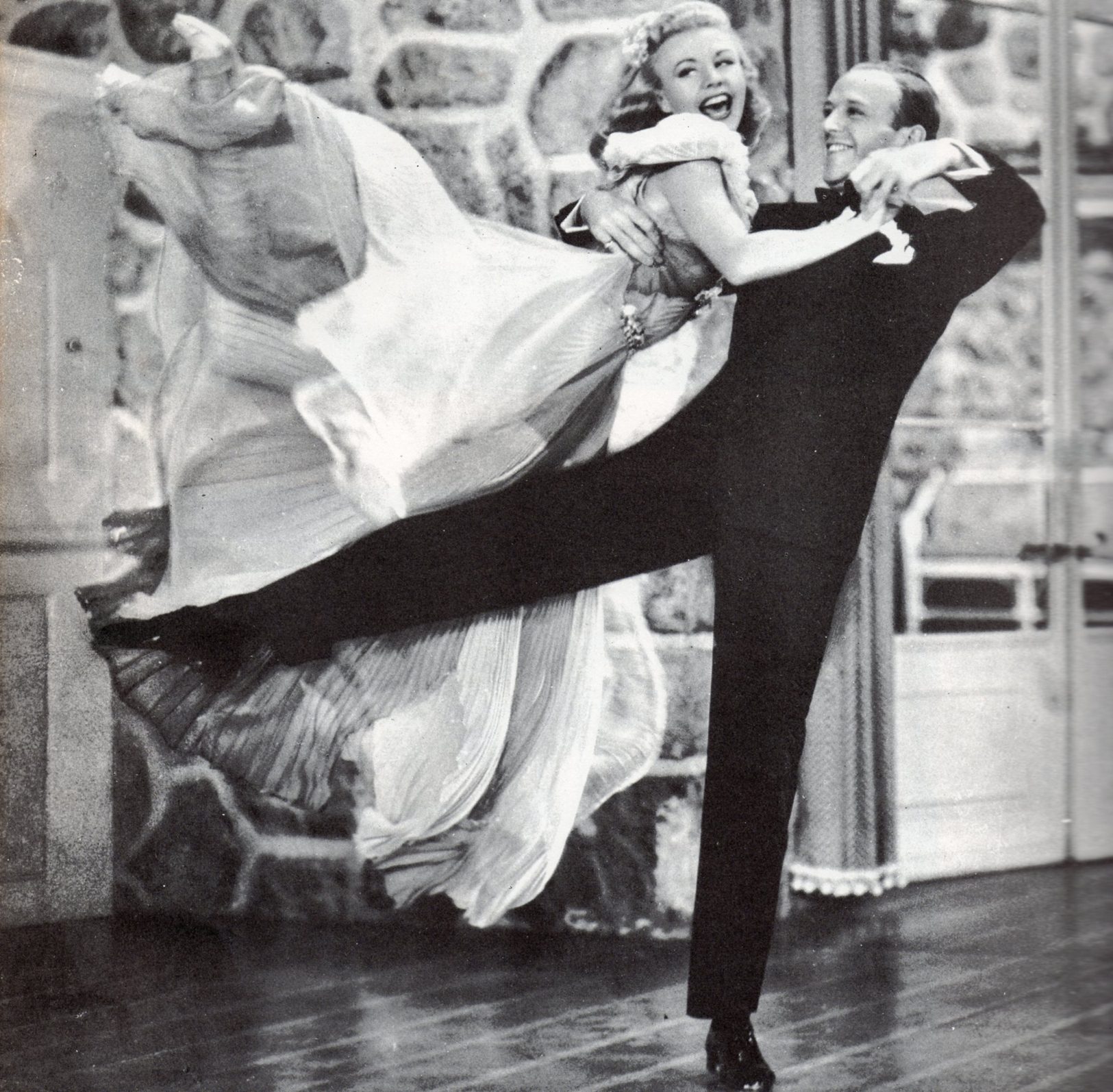 Fred Astaire & Ginger Rogers dancing Ginger joyously up in the air in "Carefree", 1938