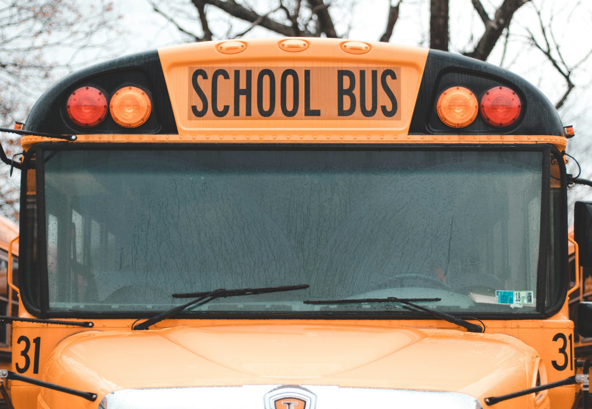 Close up of school bus windshield and sign from the front
