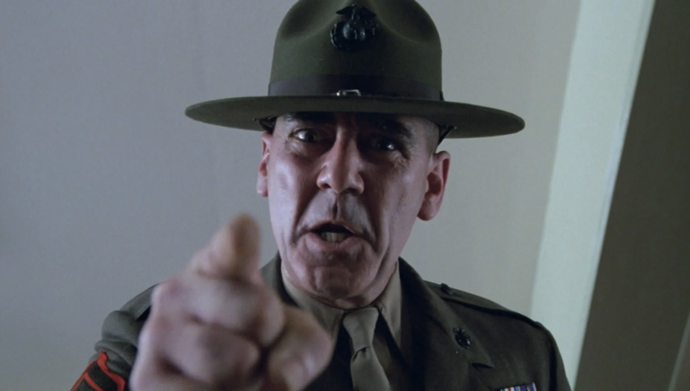 Sergeant R. Lee Ermey from Full Metal Jacket giving the full sergeant treatment. Bearing down on the viewer. Poking finger. Full on intimidation