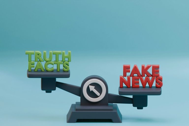 Scale with the words "Truth Facts" on one side and "Fake News" on the other. It may be an error, but the Fake News appears heavier on the scale, but the center arrow points at "Truth Facts"... but you get the idea (I think)