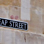 Sign on side of building for "Cheap Street"